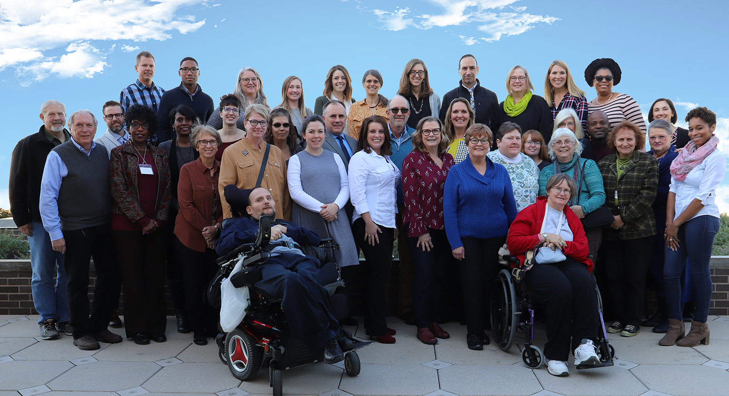 Group photo of the staff members of UMKC IHD and Advisory Leadership Team members who participated in an all organization meeting in Fall 2018
